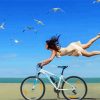 Girl Riding Bicycle On Beach paint by number